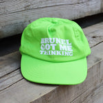 Green child's baseball cap with the slogan 'Brunel Got Me Thinking'