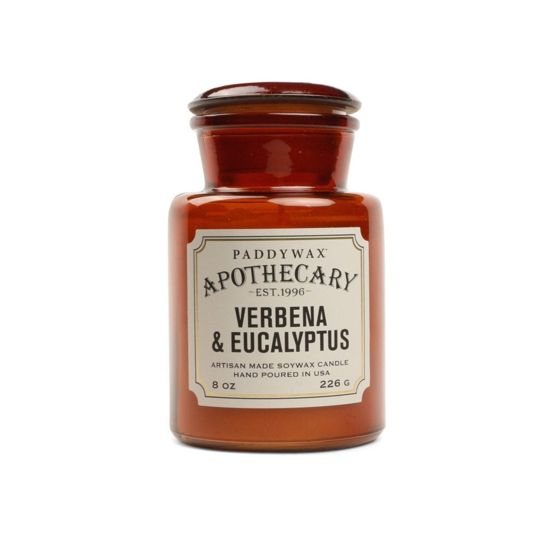 Paddywax Apothecary candle in a brown jar with a label on a white background